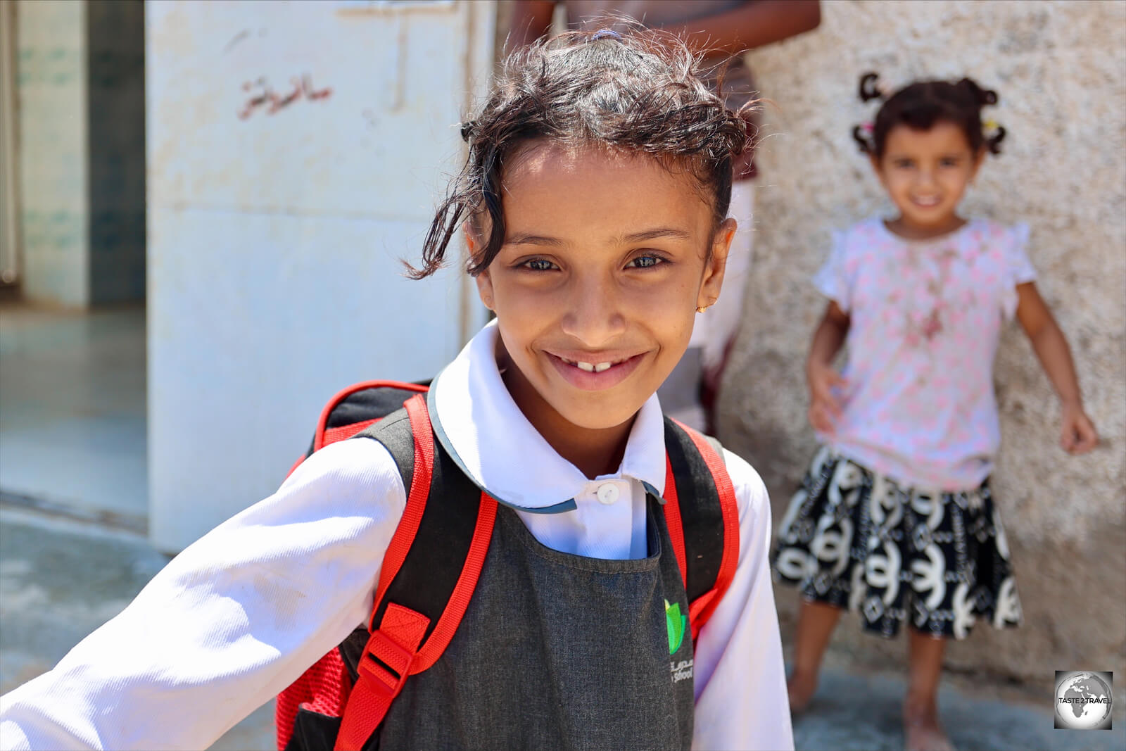 A school girl, in the 2nd largest town of Qalansiya.