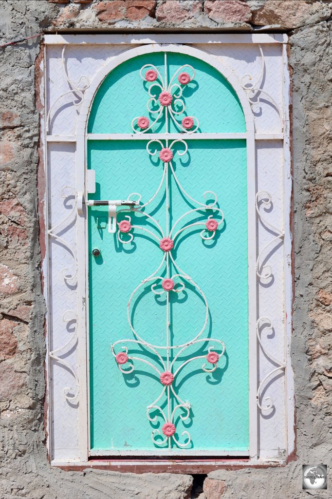 Houses on Socotra feature colourfully decorated wrought iron doors and windows.