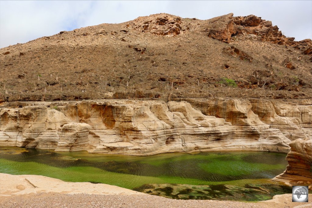 The green waters of Wadi Kalysan pass through the very remote Kalysan Canyon.