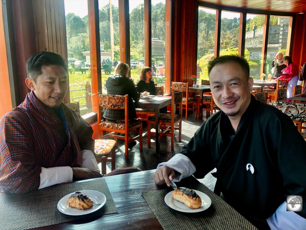 I treated my driver and guide to coffee and fresh eclairs at the Druk Wangyel Cafe. Everyone was happy!