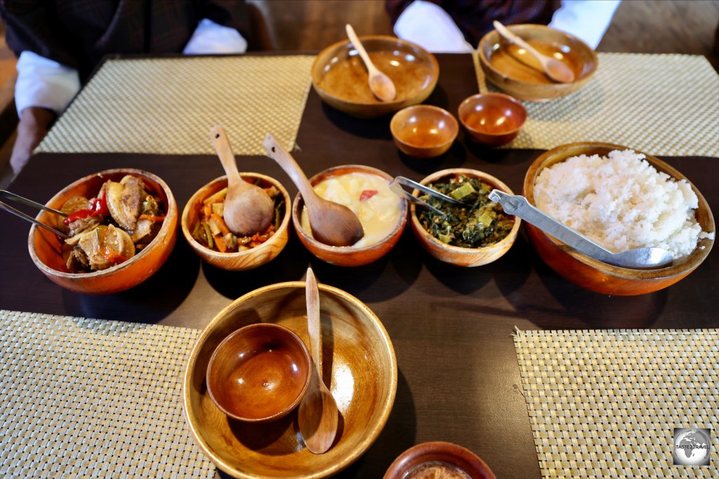 Meals in Bhutan are always served communal-style on a low table with seating on the floor.