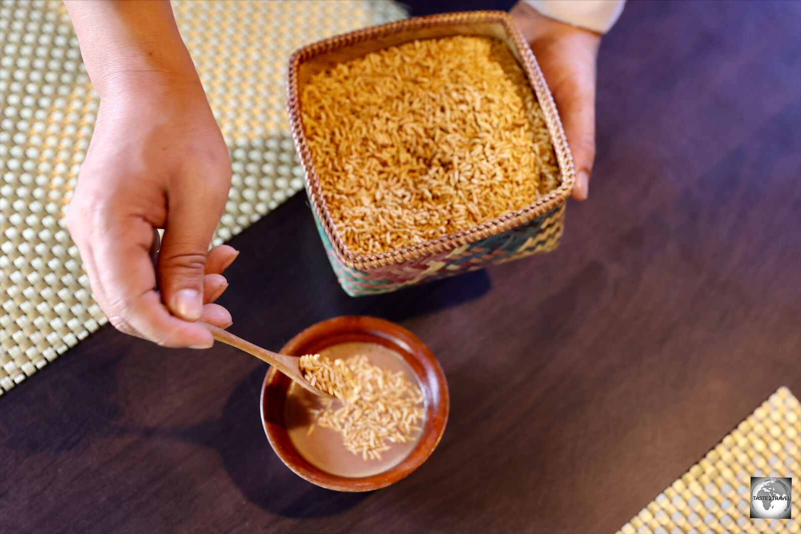 Jamyang, adding toasted rice to my yak-butter tea at Babesa restaurant in Thimphu.