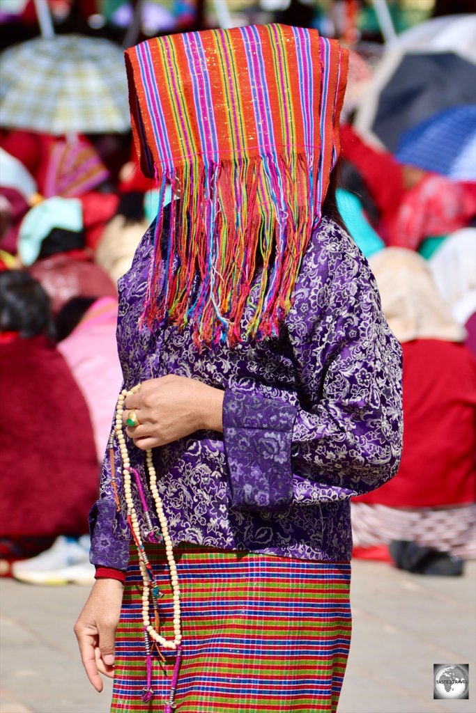 A worshiper at the Dordenma Buddha temple complex.