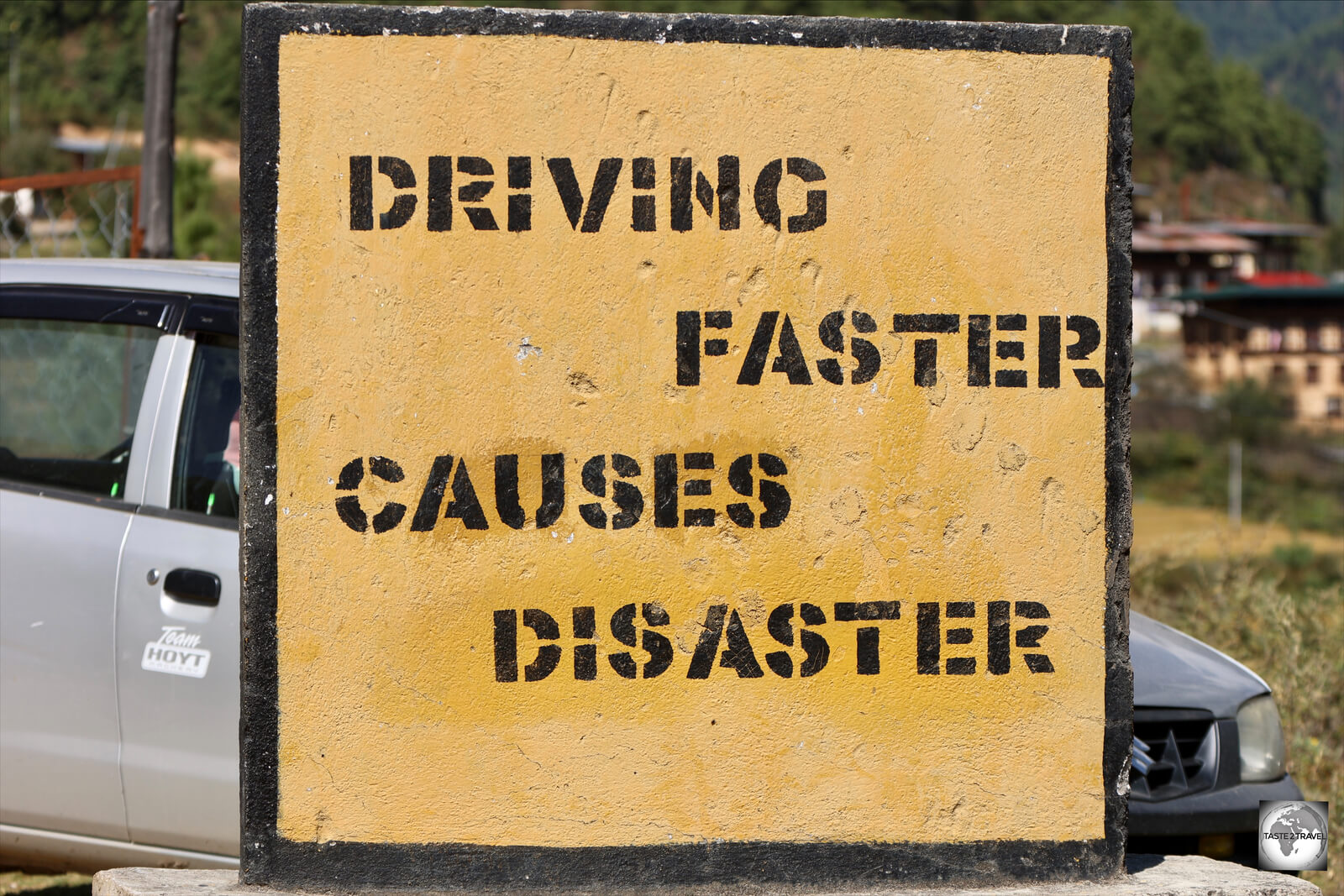 On every main road in Bhutan, road signs reinforce road safety.