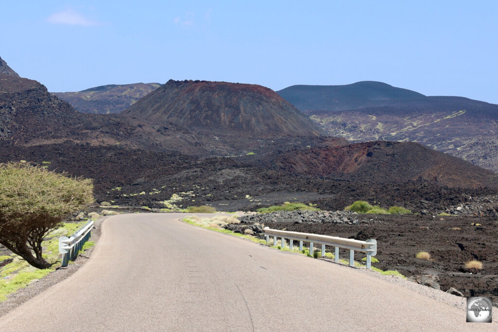 The road around Lake Assal winds its way past recently erupted volcanoes and around lava flows.