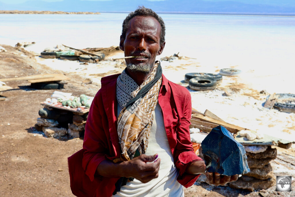 An Afar souvenir seller at Lake Assal, trying to sell me a chunk of Obsidian.