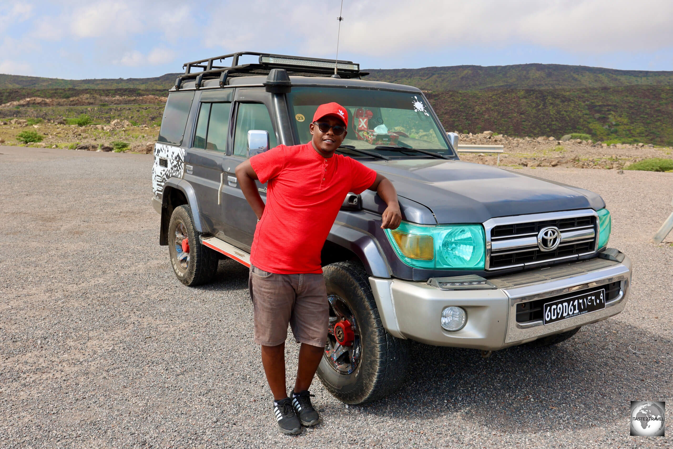 My freelance driver/ guide - <i>Akram Saleh</i> - who is a competent driver and very knowledgeable guide, parked at the Grand Canyon car park.