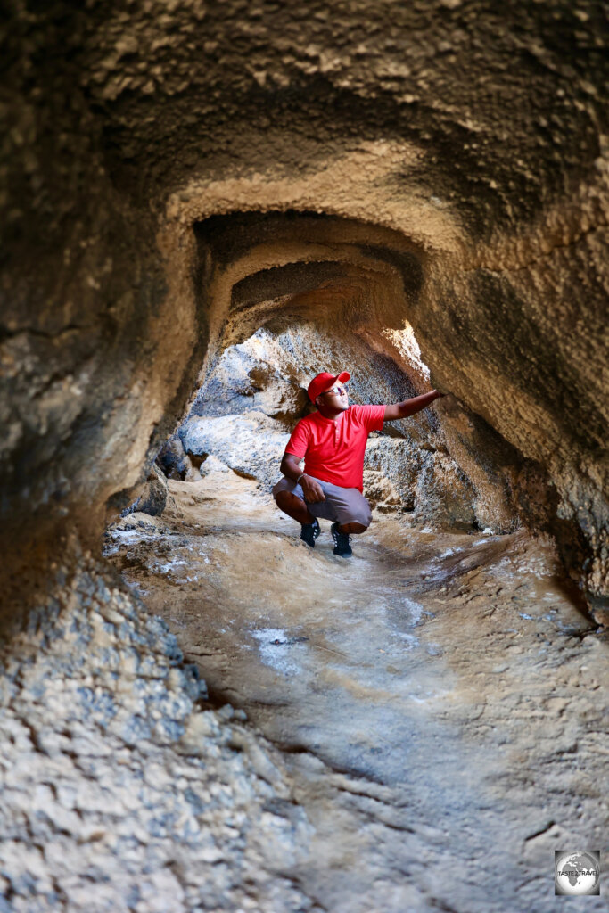 My Guide, Akram, exploring one of the small lava tunnels which was formed during the eruption of the Ardoukoba volcano.