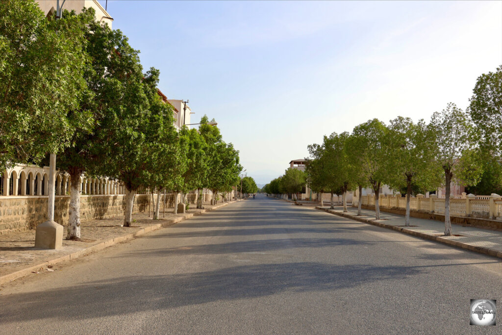 Outside the gates of the Grand Dahlak Hotel, the tree-lined streets of Massawa new town are eerily quiet.