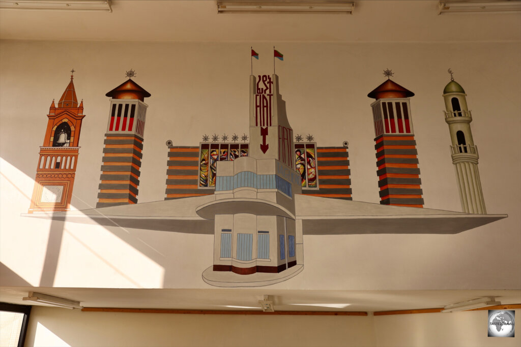 Artwork, on office wall at Damera Tours, showcases the iconic buildings of Asmara.