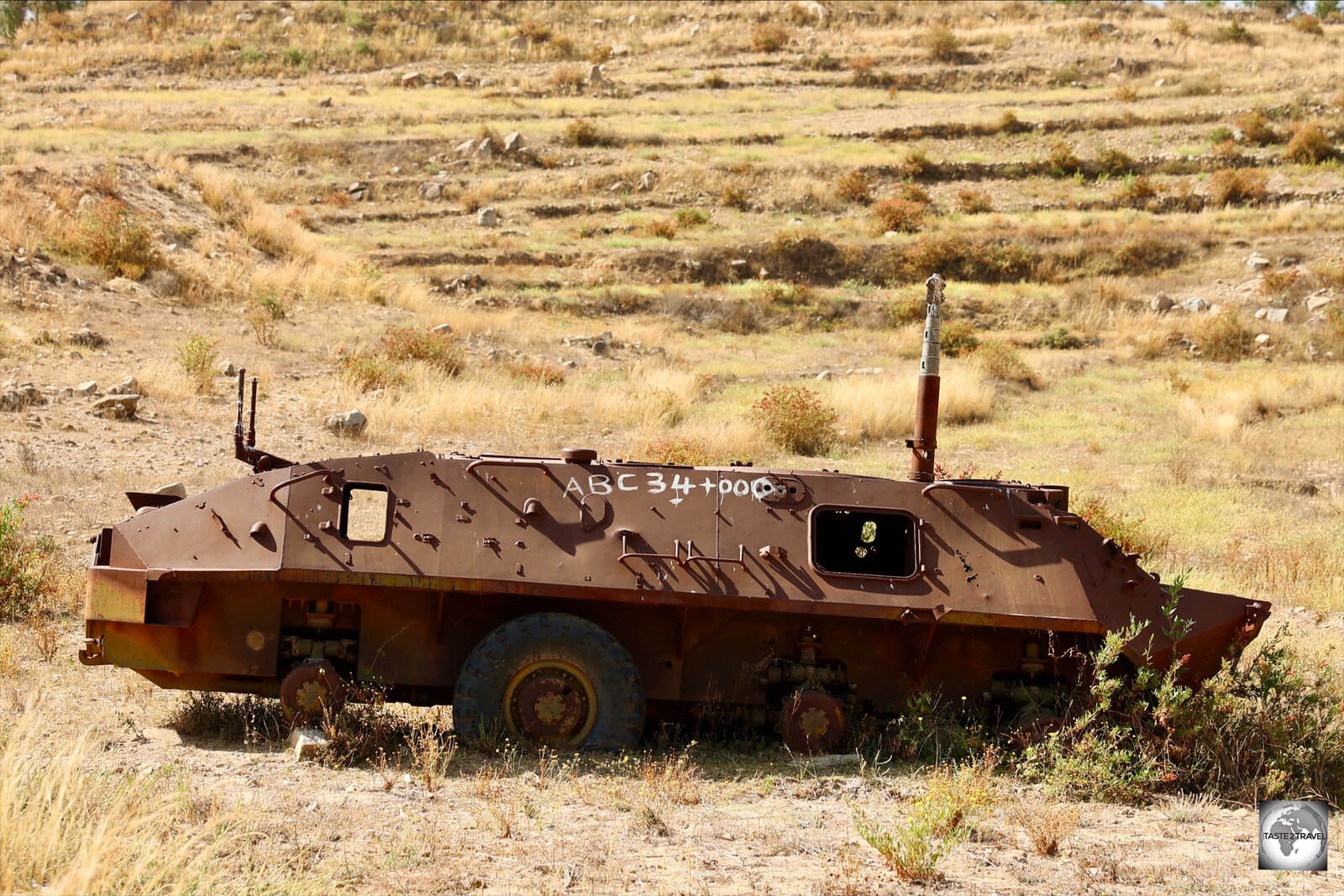 A wrecked tank on the side of the highway outside Asmara.