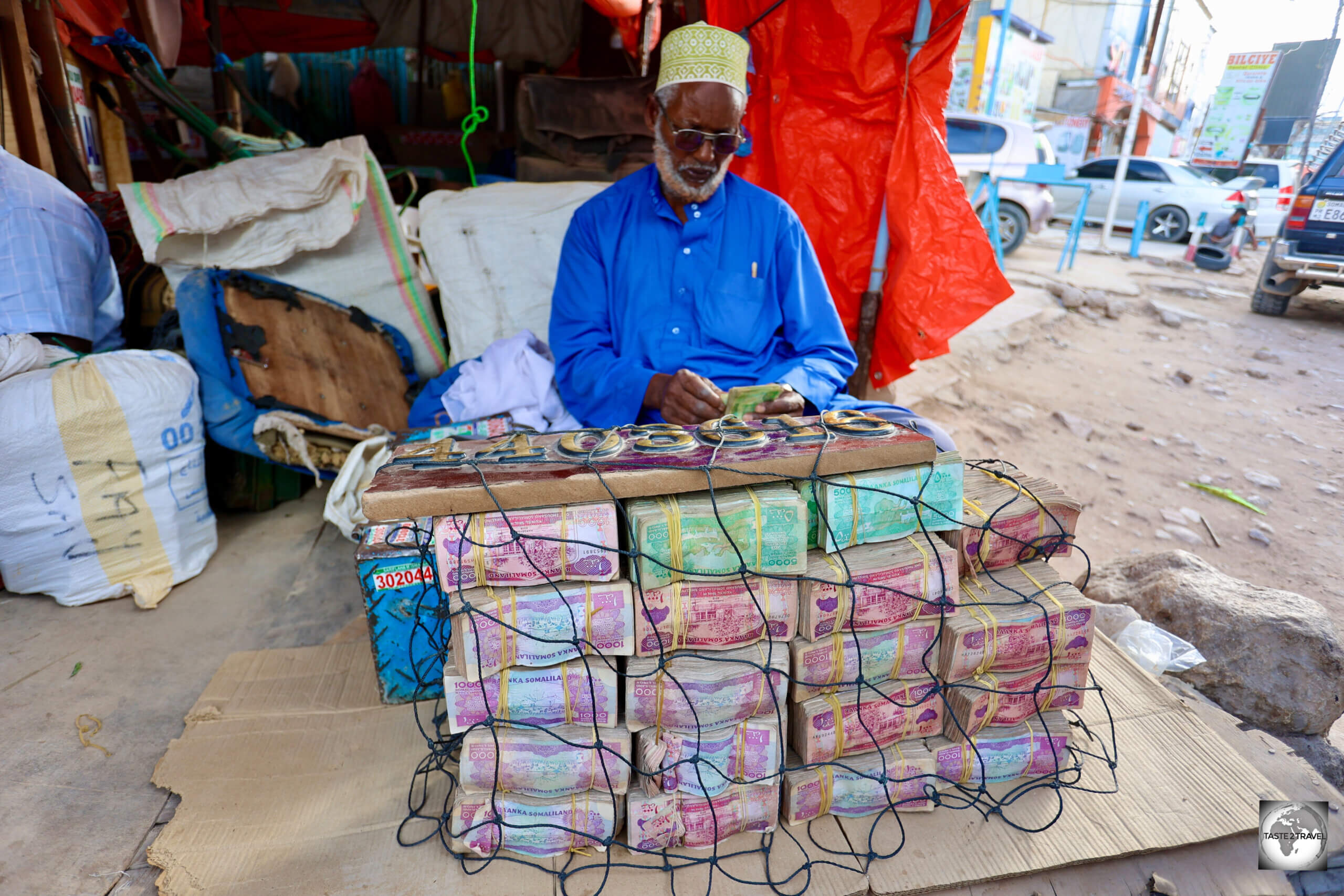 Money, money, money! The red notes (1,000 shillings) are each worth USD$0.11, while the green notes (5,000 shillings) are worth US$0.58.