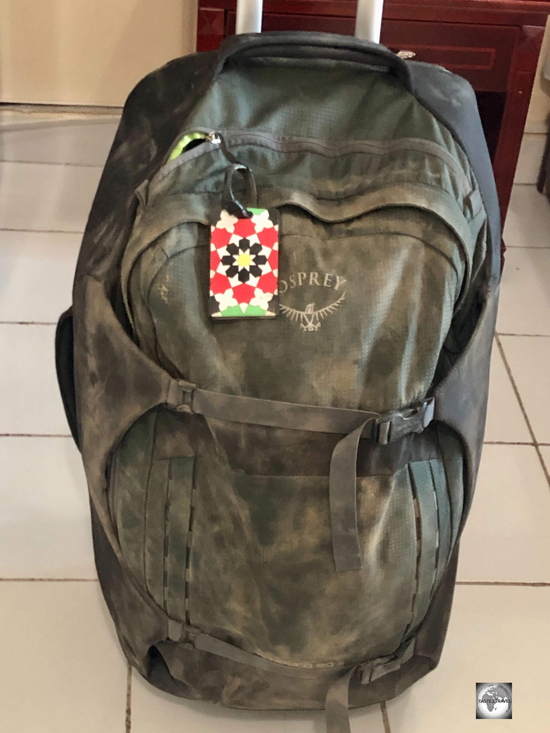 My Osprey travel bag joined me in the shower at my hotel. It survived to live another adventure.