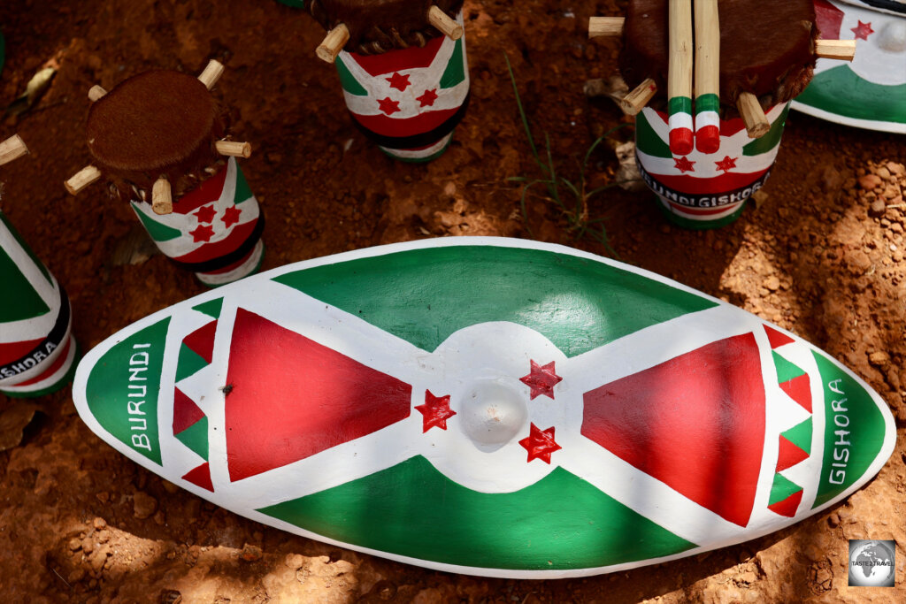 A hand-painted flag of Burundi adorns a souvenir shield.
