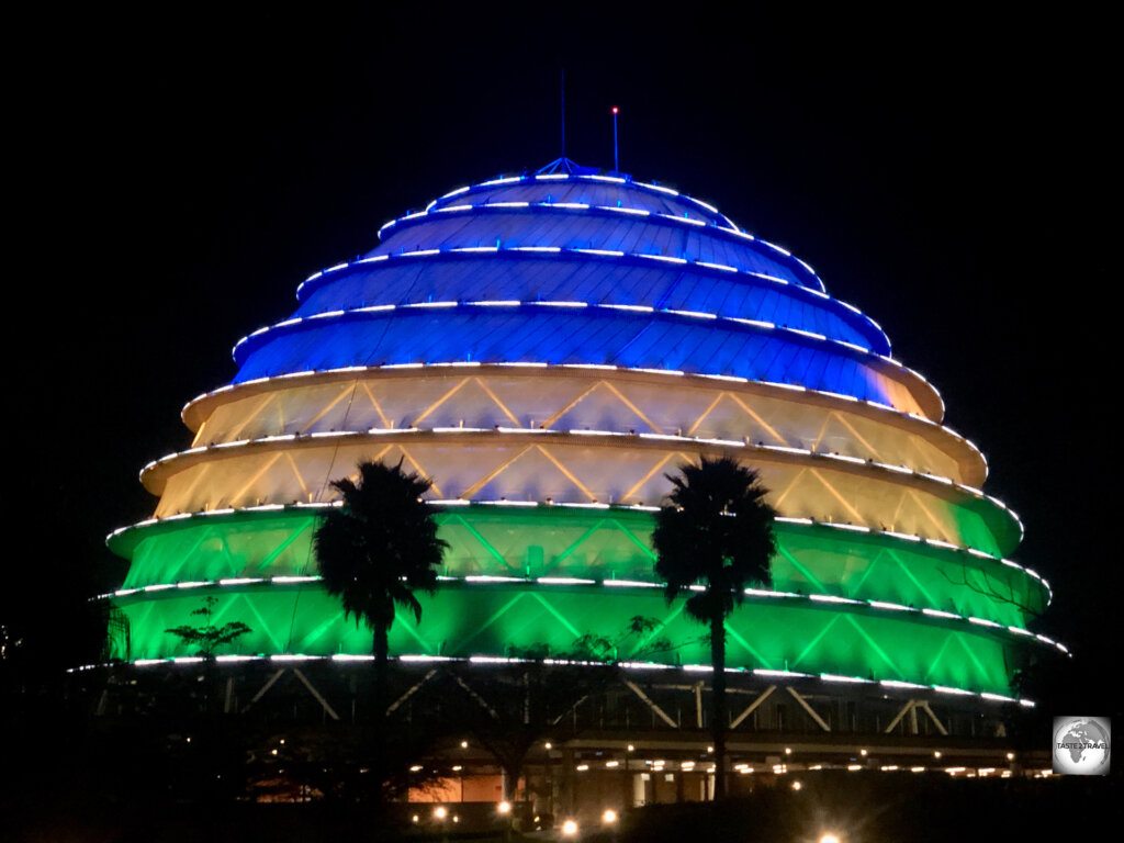 The domed roof of the Kigali Convention Centre, which is inspired by the roof of the former Royal Palace, is illuminated each evening with the national colours.