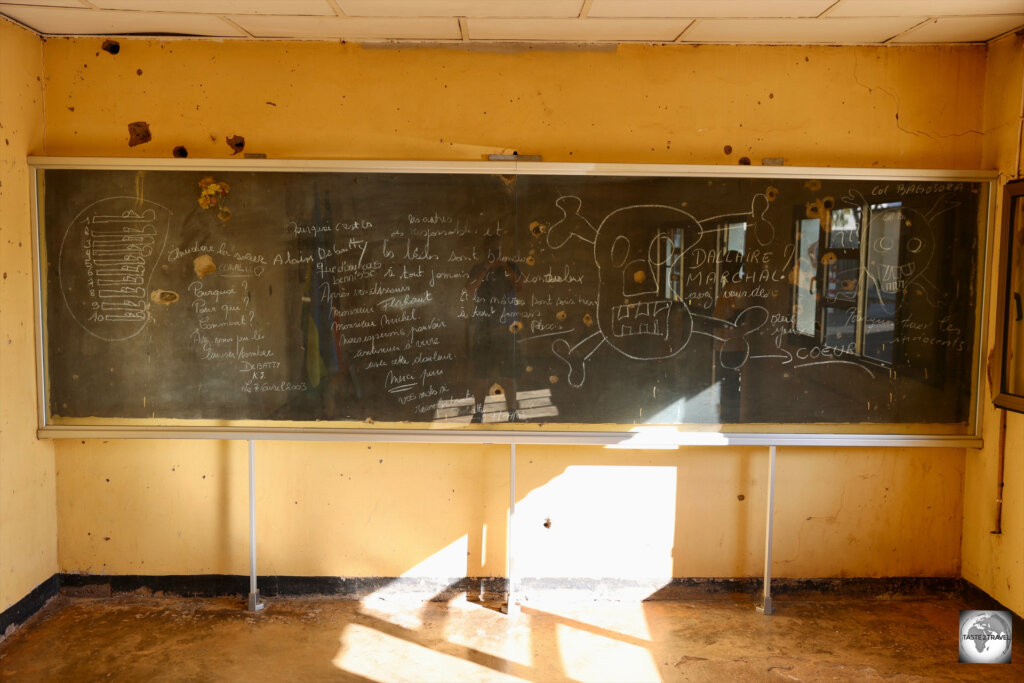 The former blackboard, in the classroom where the soldiers died, is now used as a memorial.