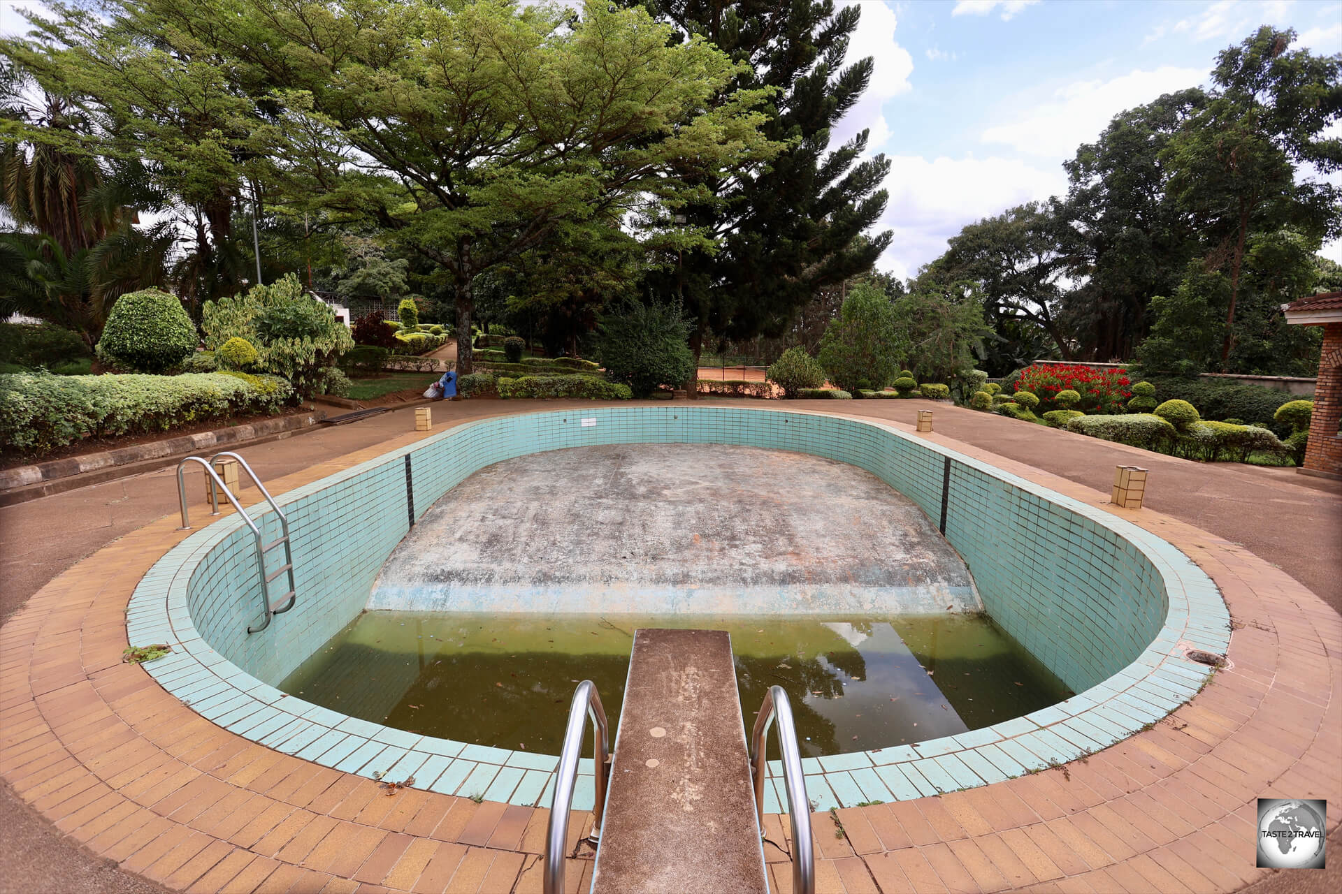 An abandoned swimming pool in the garden of the former Presidential Palace in Kigali.