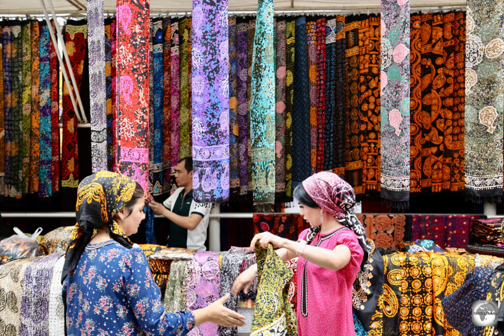 Turkmen women shopping for cloth at the Tolkuchka Bazaar in Ashgabat.