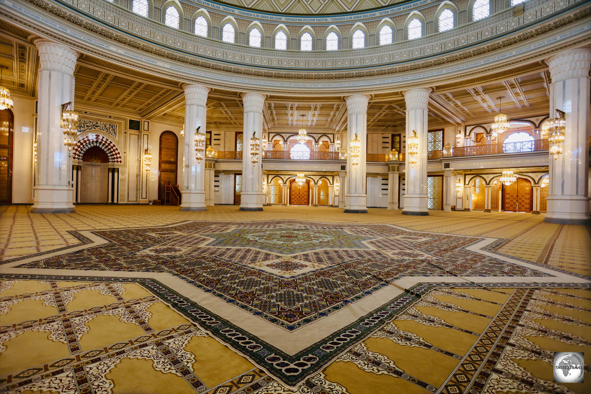 A view of the large, star-shaped, handwoven Turkmen carpet, which lies beneath the central dome, at the Turkmenbashi Ruhy Mosque.