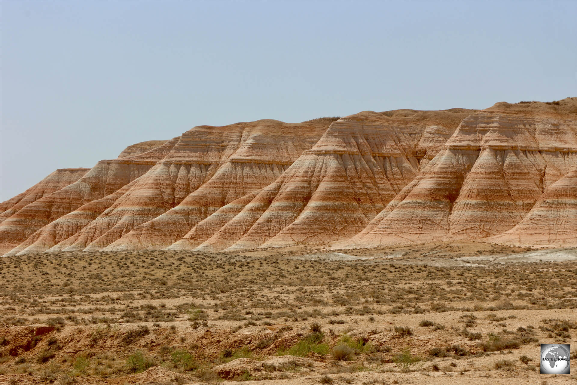 Vibrant, colourful, rock formations at Yangykala Canyon are the result of iron minerals in the soil.