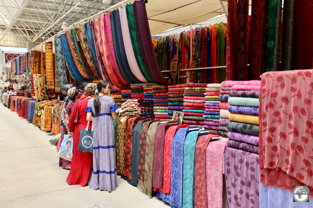 Turkmen women shopping for cloth at Tolkuchka Bazaar in Ashgabat.