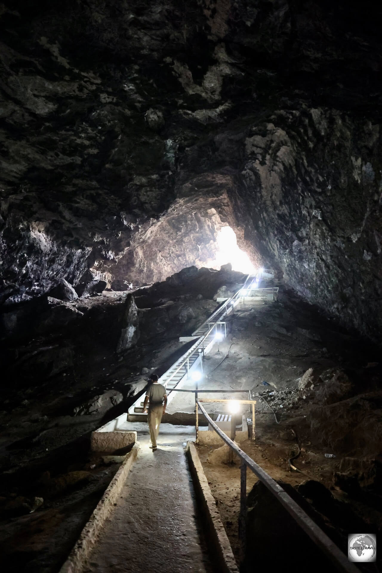 A view of the long stairway, which descends 55-metres through the cave, to Kow Ata underground lake.