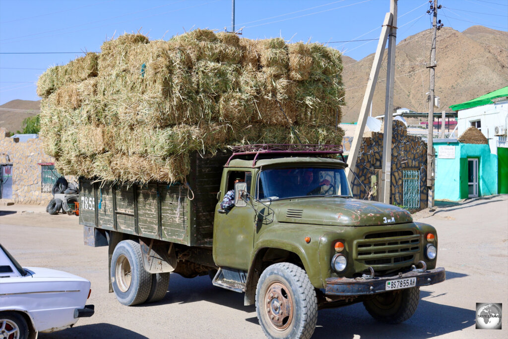 A truck, fully laden with hay, in Nokhur village, Turkmenistan.
