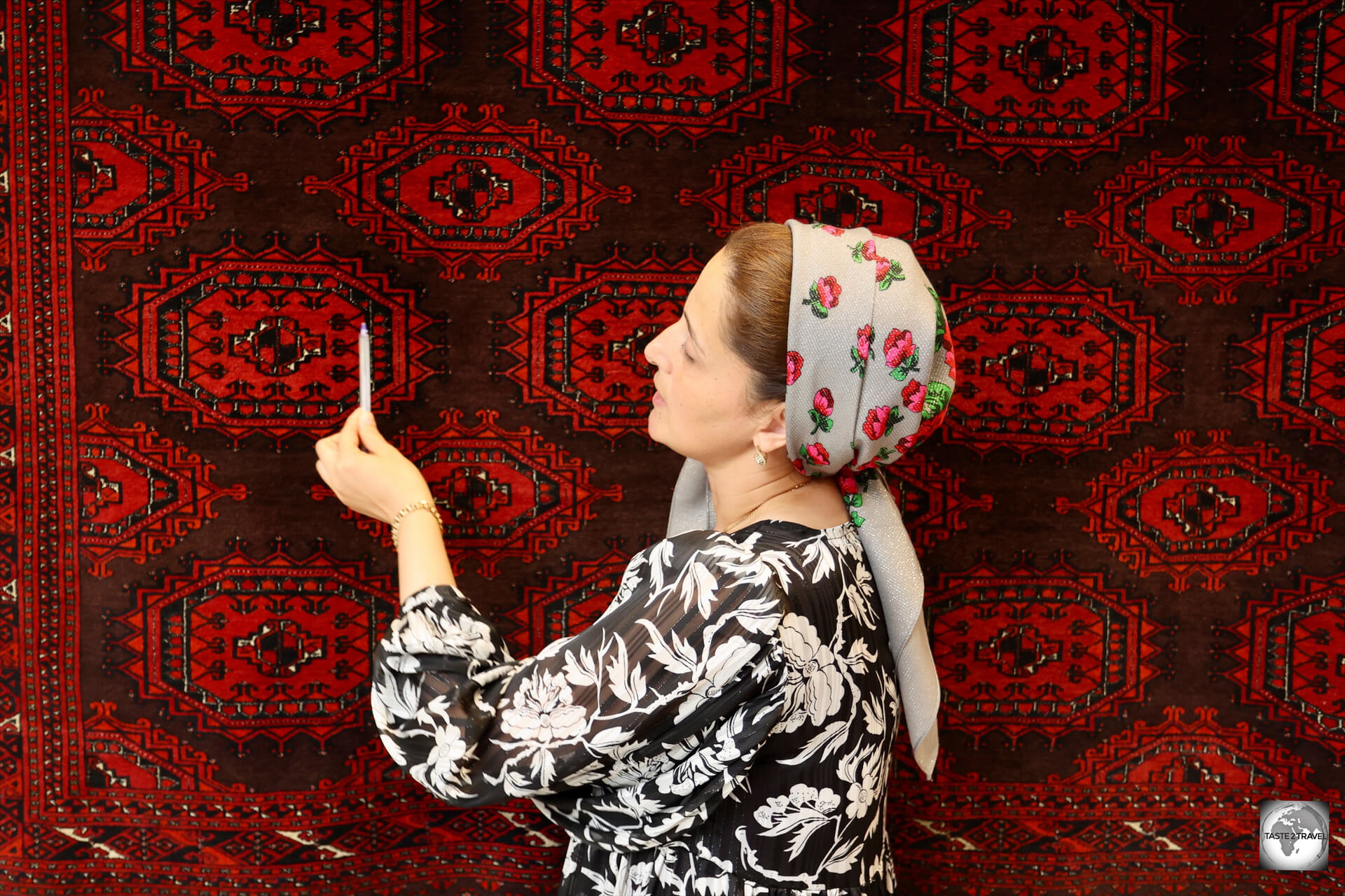 Learning the secrets of Turkmen carpets, from an expert guide, at the Turkmen Carpet Museum in Ashgabat.