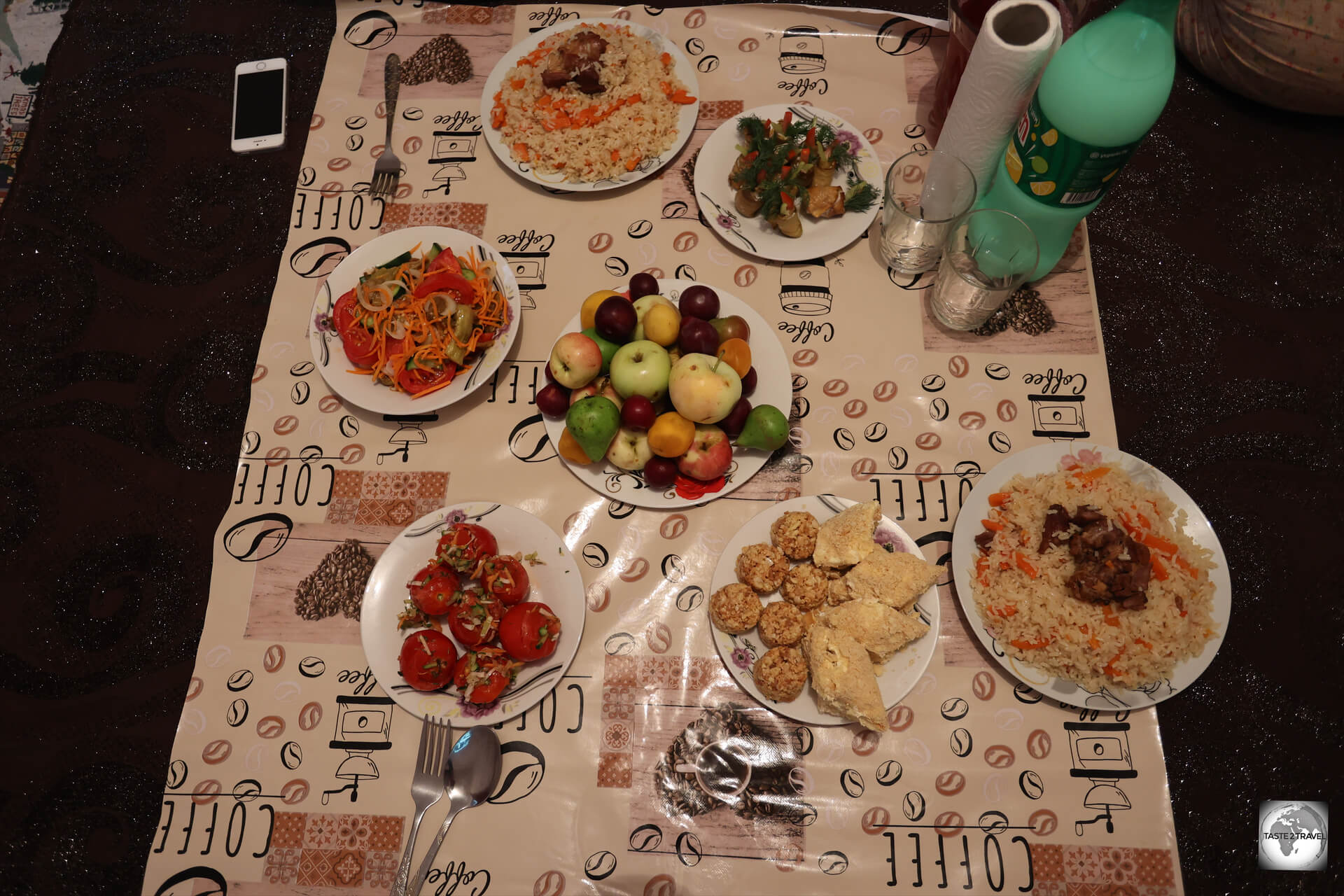 A traditional Turkmen dinner of Plov, salad and vegetables which was prepared by Rejep's wife.