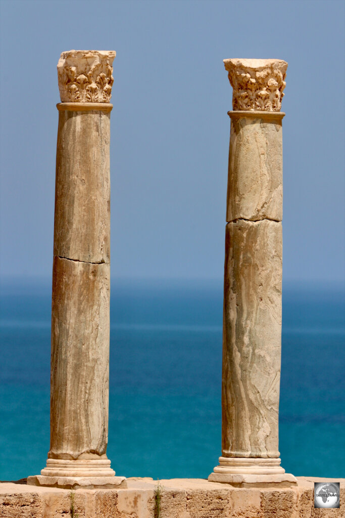 The Meditereanean Sea forms a nice backdrop to two marble columns on the top tier of the Roman theatre at Leptis Magna.