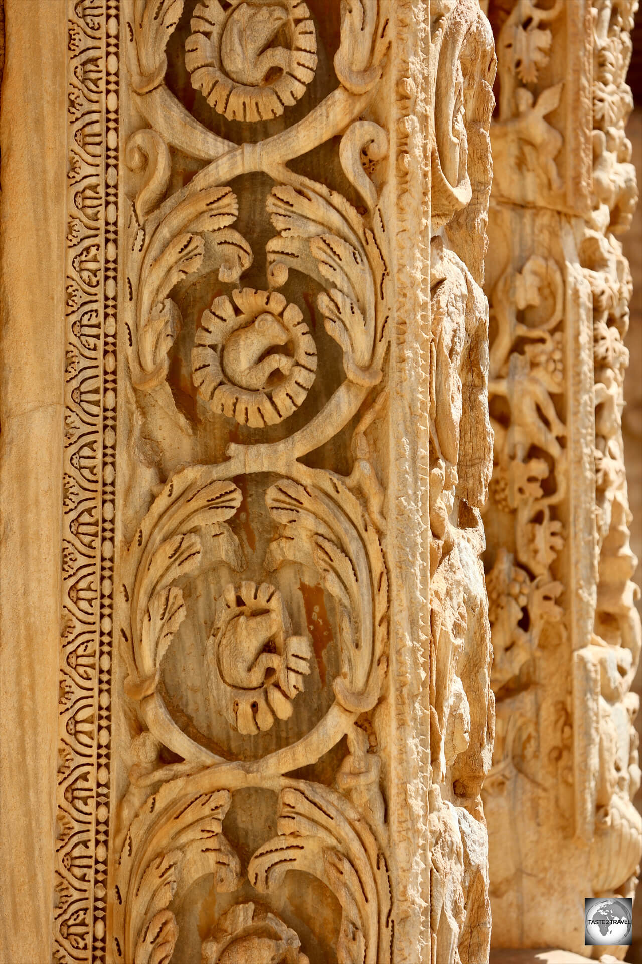 The intricately carved Column of Dionysus stands at the entrance to the Severan Basilica.