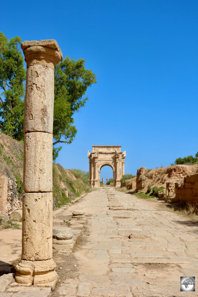 A random marble column and the Arch of Septimius Severus in the background.