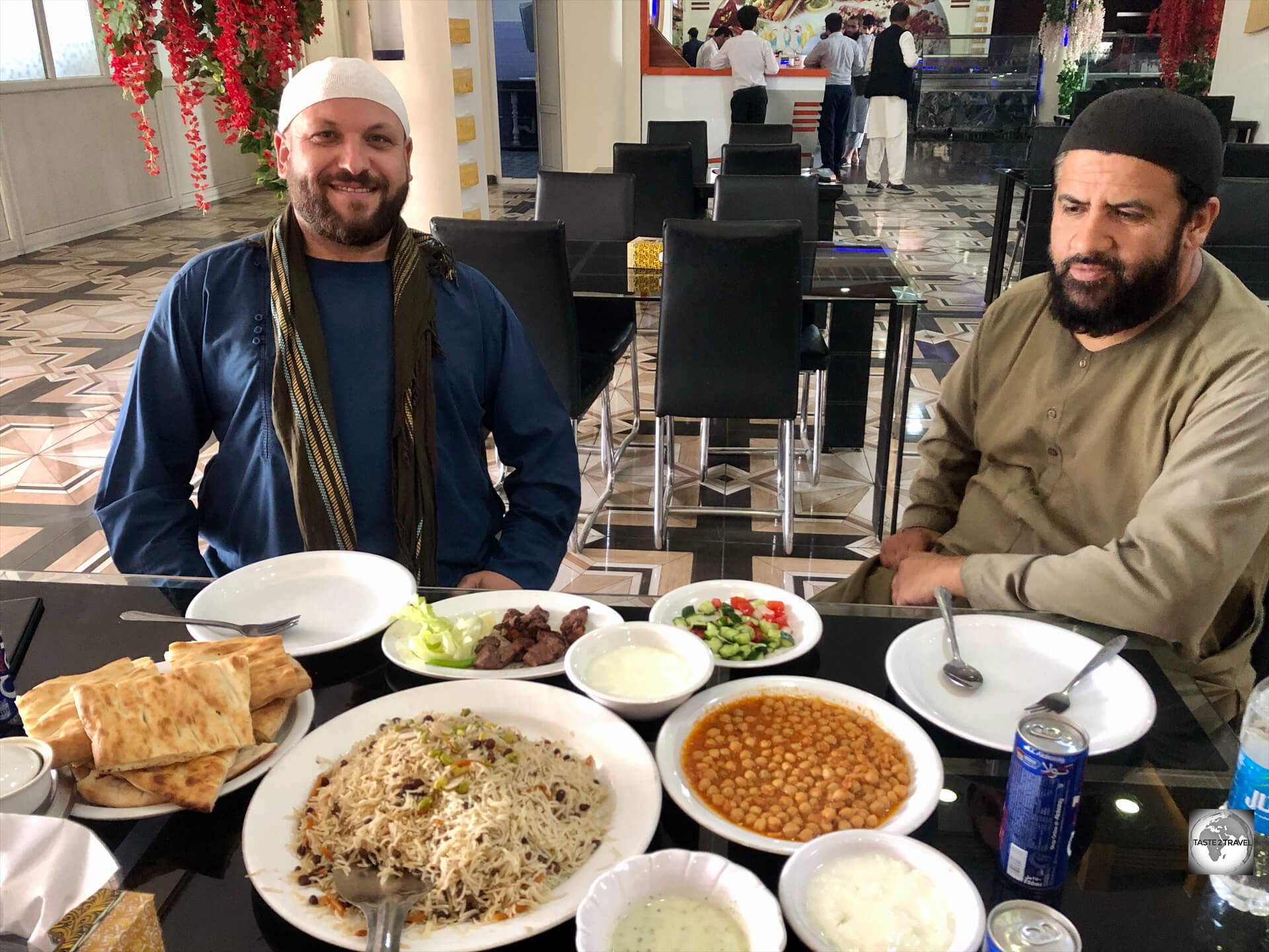 Enjoying a typical Afghan lunch with my guide, Jamshyd (left) and my driver, Jaleel, at the Jumairah restaurant in Kabul.