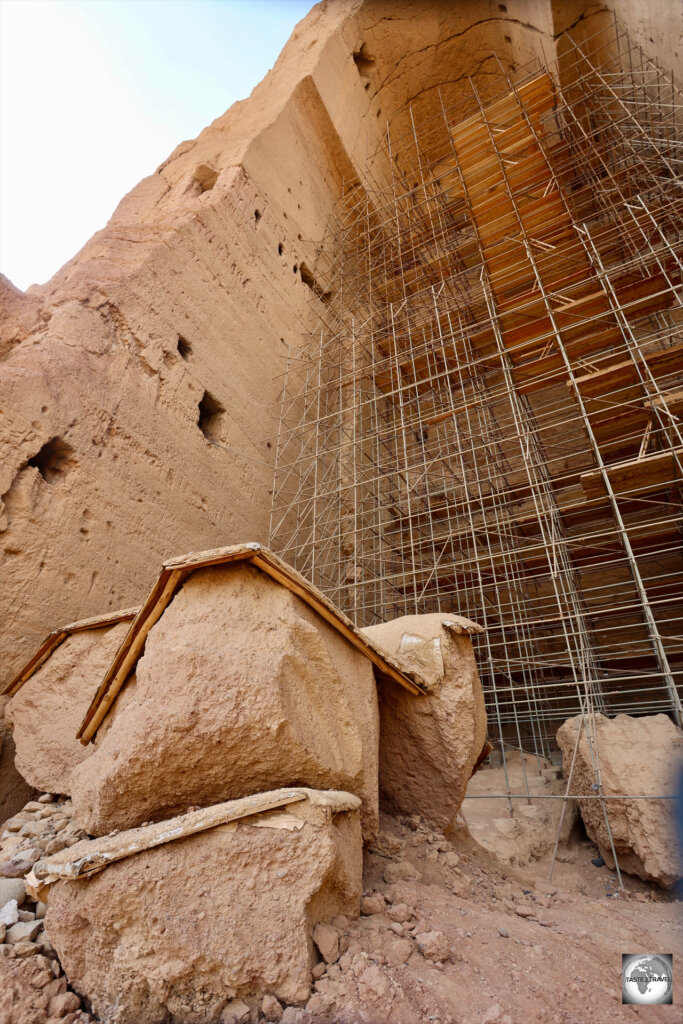 Fragments from the destroyed Western Buddha have been covered, pending future restoration.