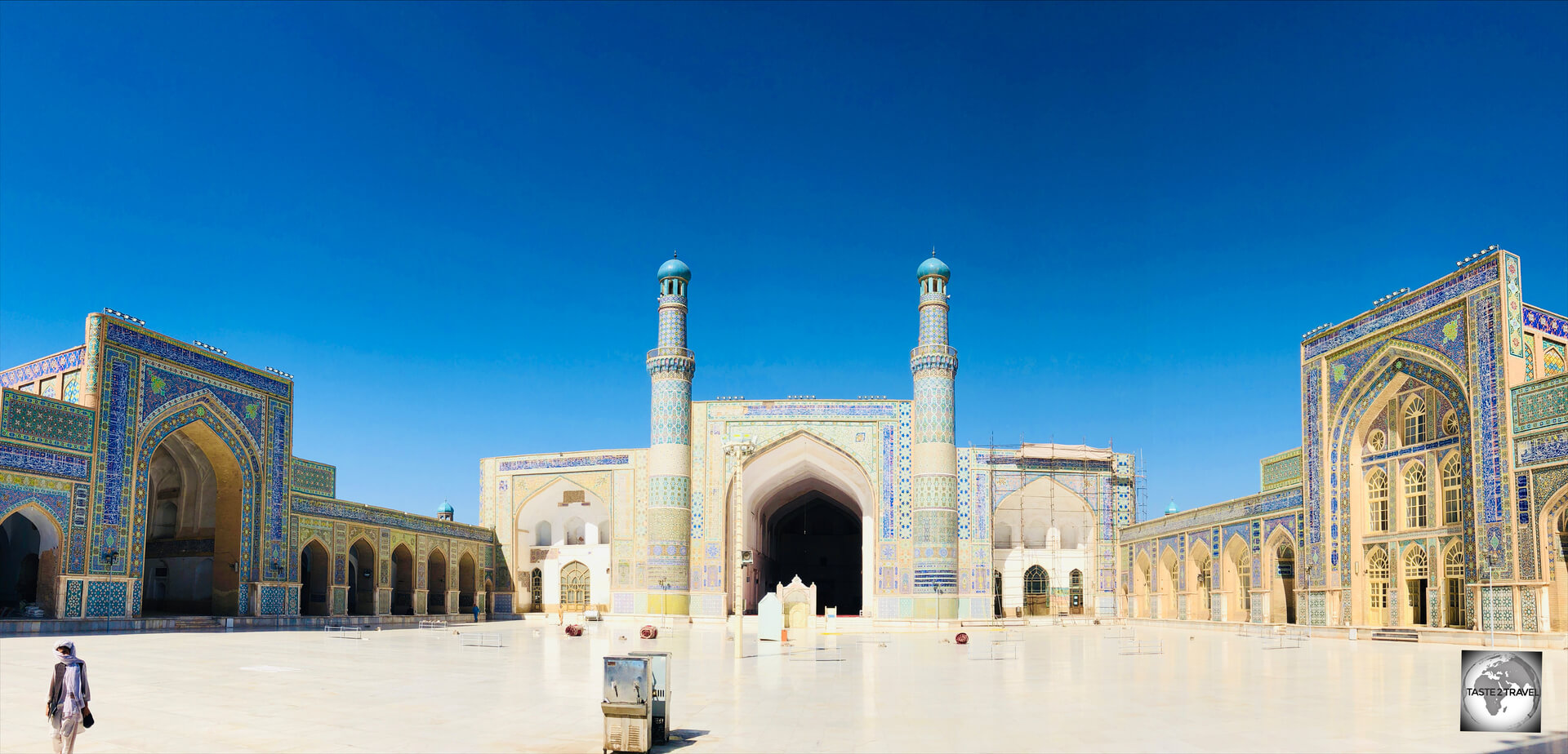 The white marble courtyard of the Great Mosque of Herat, with a view of three of the four <i>Iwans.