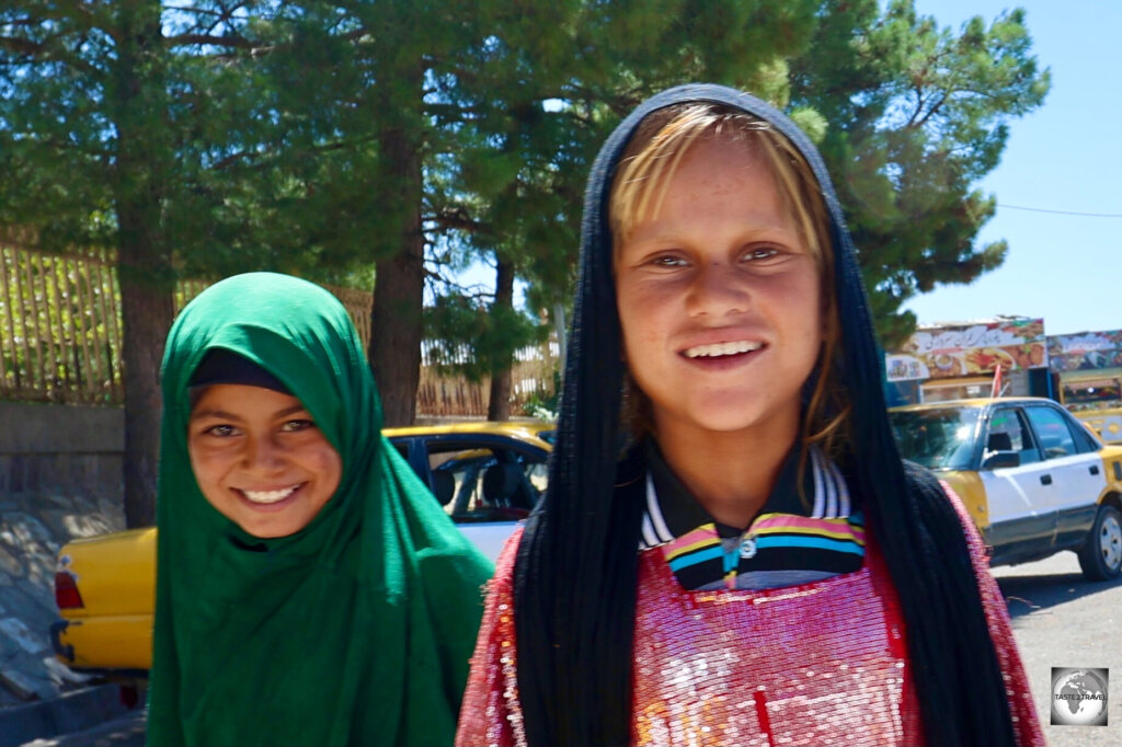 While photographing older woman is not allowed in Afghanistan, younger girls are happy to be photographed.