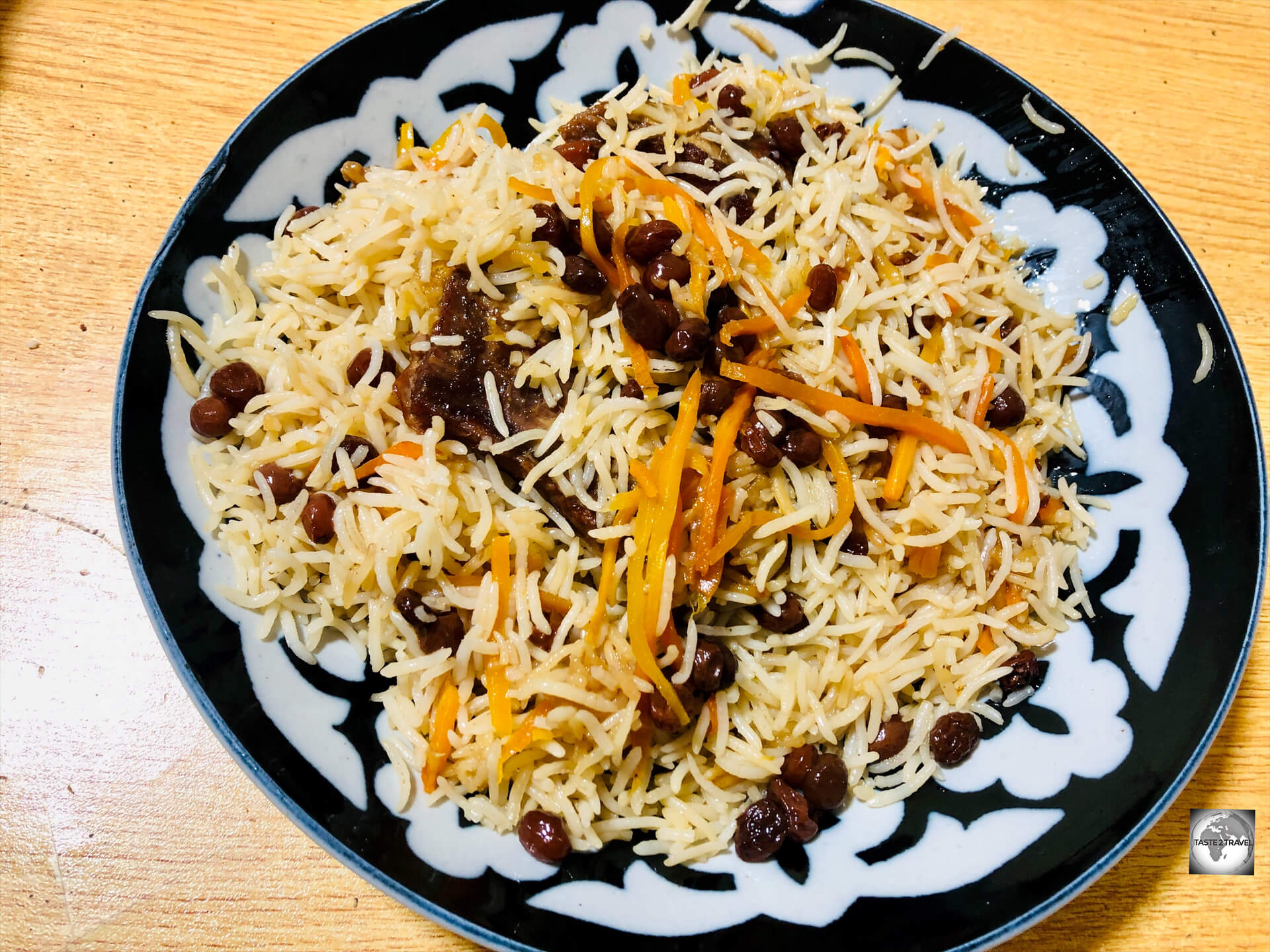 Enjoying a plate of <i>Kabuli Pulao</i> in Kabul.