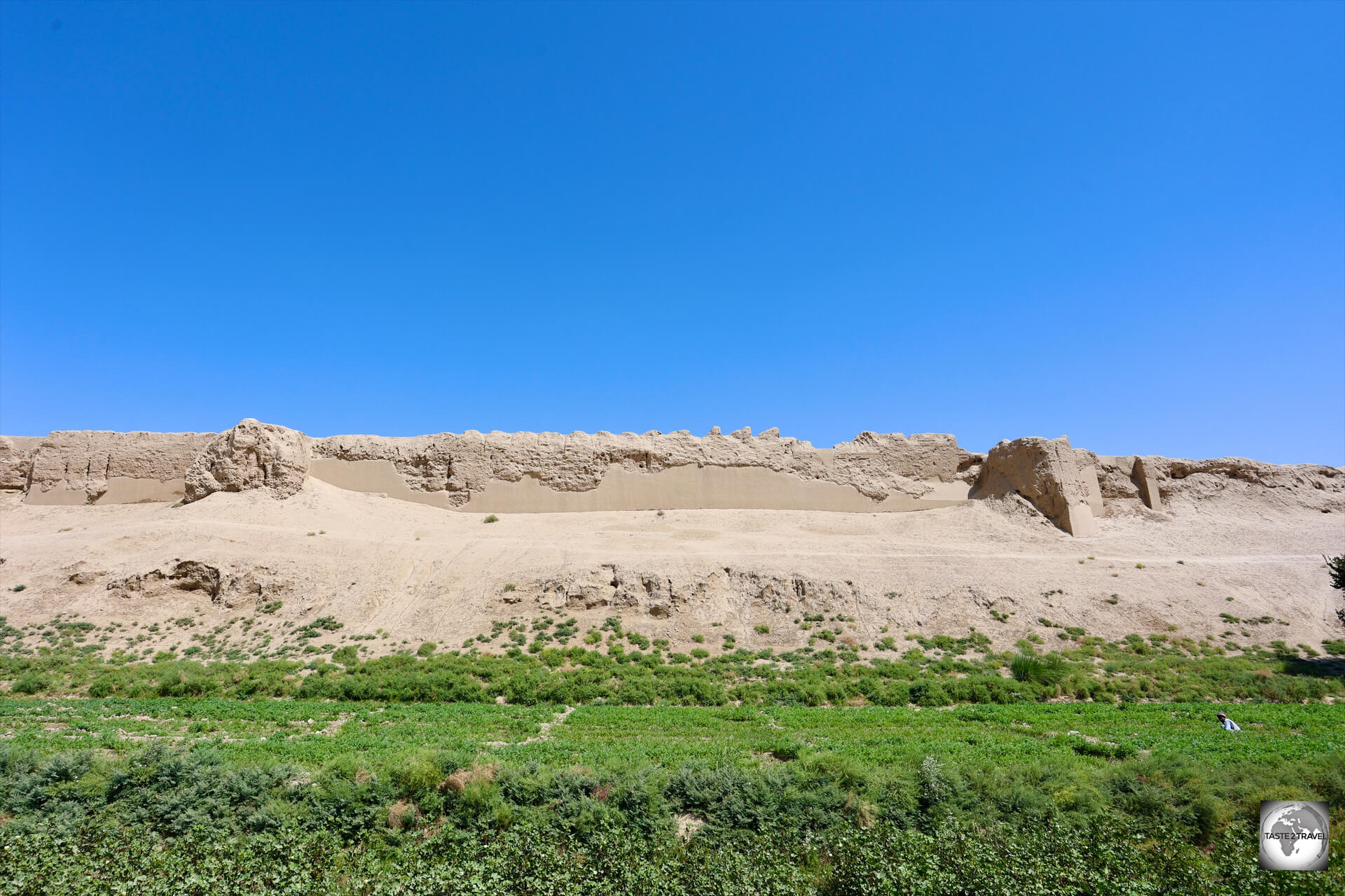 The ancient, earthen, city walls still surround the modern town of Balkh.
